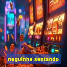 neguinha sentando